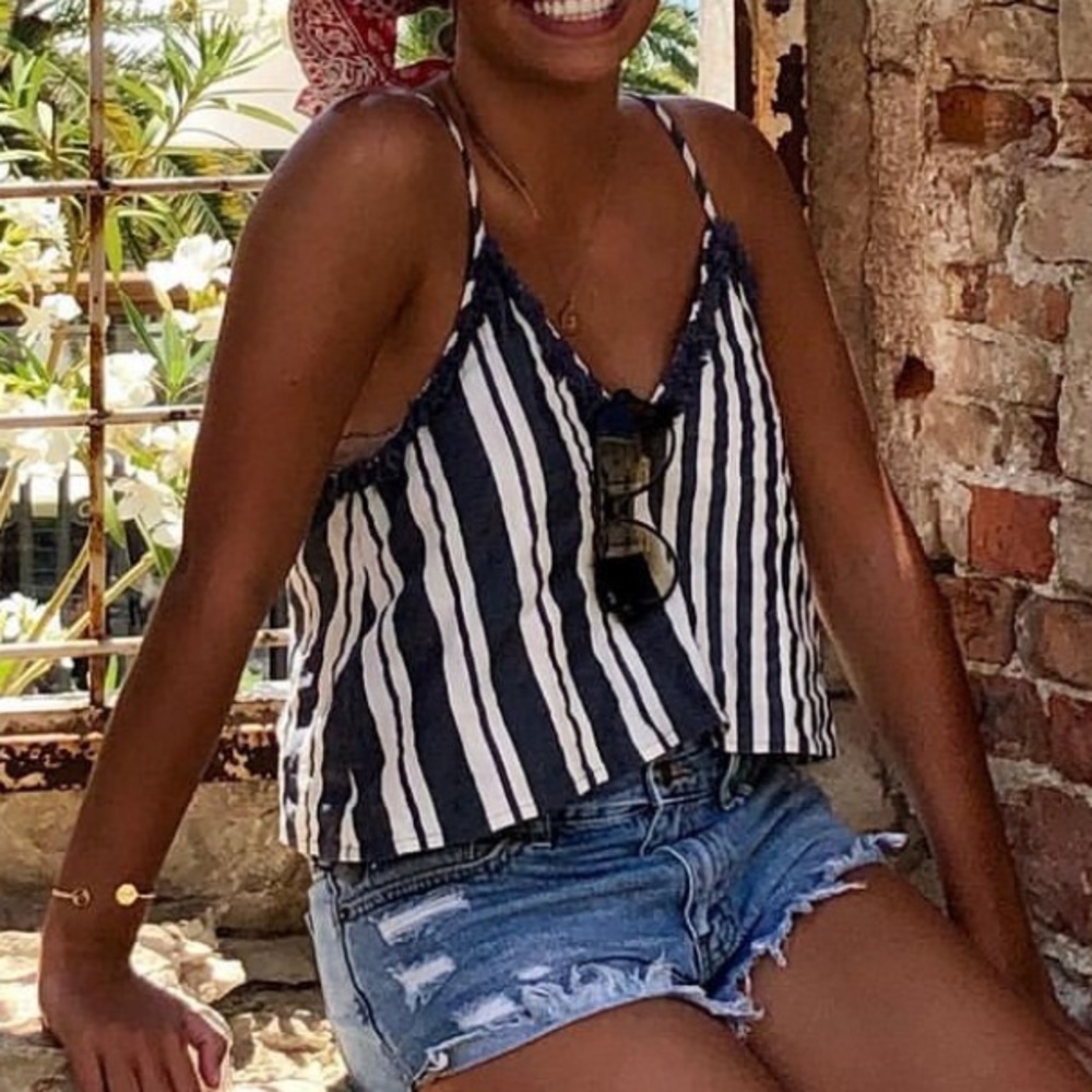 Blue and white striped top with fringe detail